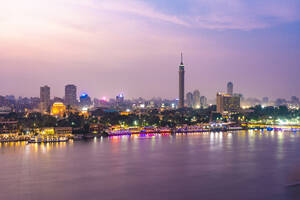 Egypt, Cairo, Nile with Cairo Tower on Gezira Island at dusk - TAMF02457