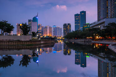 Reflection Of Buildings In City At Dusk - EYF09108