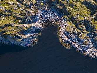 Aerial view of rocky shore of Barents Sea - KNTF04763
