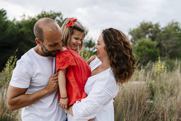 Cheerful family enjoying at countryside - EGAF00364