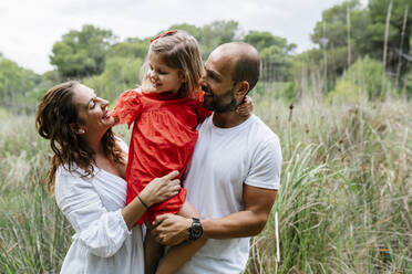 Happy family enjoying at countryside - EGAF00370