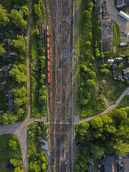 Russia, Leningrad Oblast, Tikhvin, Aerial view of stationary railroad cars - KNTF04802