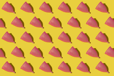 Pattern of rows of pink menstrual cups - GEMF03922