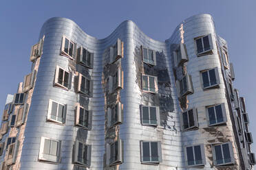 Germany, North Rhine-Westfalia, Dusseldorf, Steel facade of central building of Neuer Zollhof complex - MMAF01342