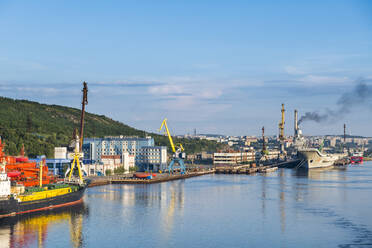 Russia, Murmansk, Rusatom, Ships and cranes at port - RUNF03780