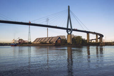 Germany, Hamburg, Kohlbrand Bridge against clear sky at dusk - IHF00362