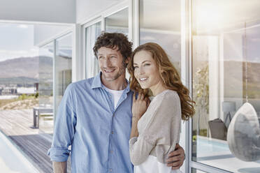 Couple at luxury beach house enjoying the view - RORF02247