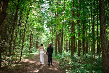 Married couple standing in nature - ADSF00122