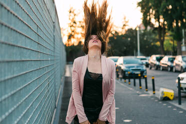 Attractive charming happy lady going on street near cars - ADSF00494