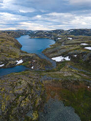 Russia, Murmansk Oblast, Teriberka, Aerial view of lakes surrounded by rocky hills - KNTF04929