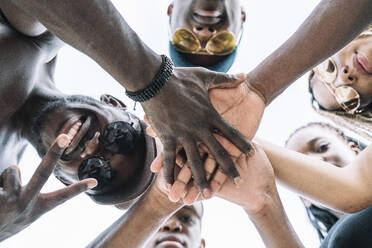 Group of friends stacking hands - ADSF01077