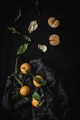 Fresh tangerines in season. Flat lay. Top view On dark background - ADSF01132