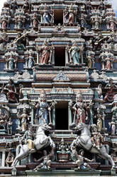 Hindu gods adorn the five storey Raja Gopuram, Sri Mahamariamman Hindu Temple, Kuala Lumpur. Malaysia, Southeast Asia, Asia - RHPLF16083