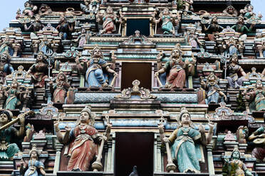 Hindu gods adorn the five storey Raja Gopuram, Sri Mahamariamman Hindu Temple, Kuala Lumpur. Malaysia, Southeast Asia, Asia - RHPLF16084