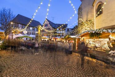 Christmas market at the Place du Marche aux Saules, Eguisheim, Alsace, France, Europe - RHPLF16144