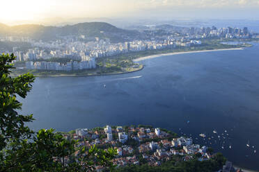 Urca in foreground and Flamengo in background neighbourhoods with central Rio de Janeiro in the distance and Guanabara Bay, Rio de Janeiro, Brazil, South America - RHPLF16166