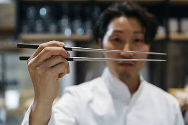 Japanese chef with chopsticks - ADSF01404