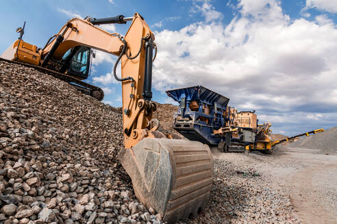Quarry land with heavy industrial machinery - ADSF01584