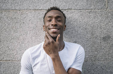 African man in white shirt posing. - ADSF02125