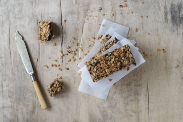 Homemade granola bars on baking parchment - ADSF02445