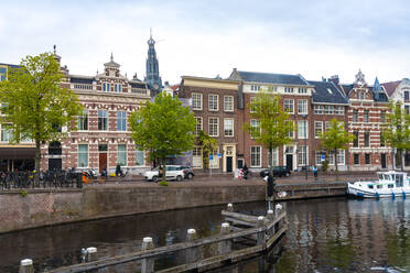 Netherlands, North Holland, Haarlem, Historic houses along Binnen Sparne canal - TAMF02533