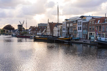 Netherlands, South Holland, Leiden, Sailboat moored in old harbor by Galgewater - TAMF02590