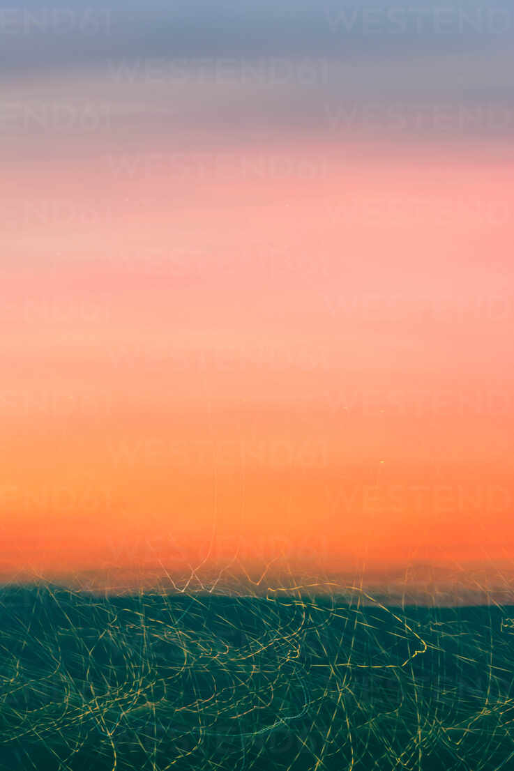 Moody and dramatic colorful sky at sunset - Stock Photo - Dissolve