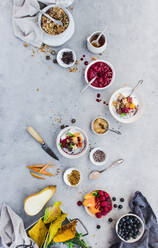 From above shot of delicious chia parfait and various fruits and grain lying on marble tabletop - ADSF04037