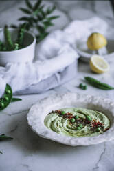 Bowl with tasty mashed peas - ADSF04489