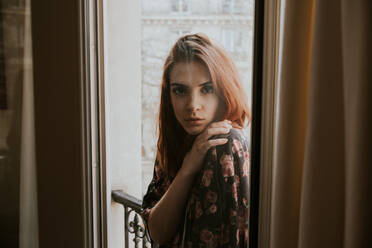 Young woman posing at window - ADSF05090