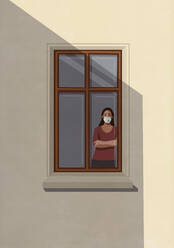 Portrait woman in protective mask standing at apartment window - FSIF04707