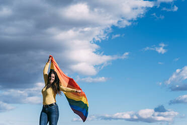 Young woman with gay flag - ADSF05328