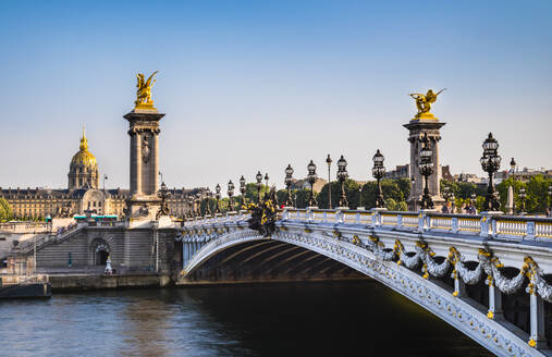 Bridge Alexandre III over Seine river against clear blue sky in Paris, France - HSIF00769