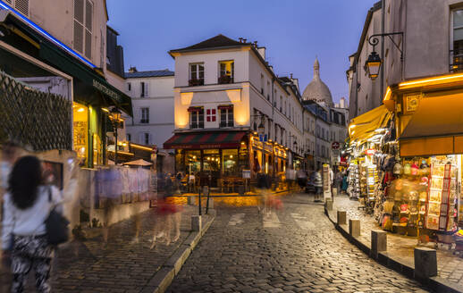 Tourists walking on street of Montmartre in Paris, France - HSIF00773