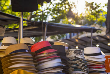Varieties of hat at roadside stall in Paris, France - HSIF00774