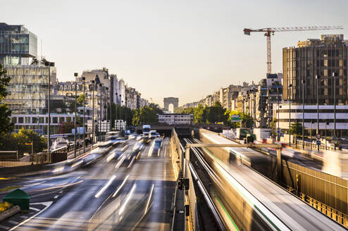 Rust hour at Arc de triomphe against clear sky, Paris, France - HSIF00779