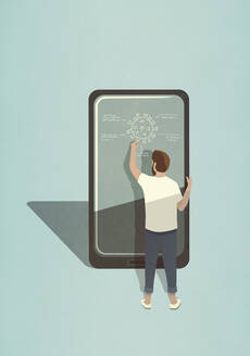 Male scientist diagraming COVID-19 coronavirus on large smart phone screen - FSIF05037