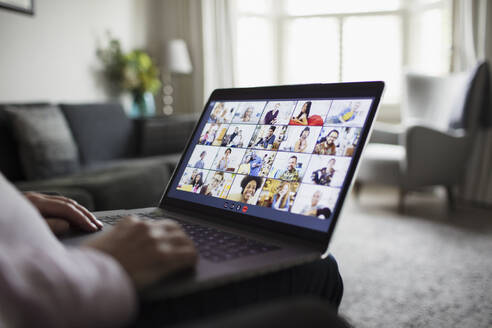 Colleagues video conferencing on laptop screen - CAIF28770