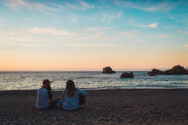 Couple with guitar on beach - ADSF06478