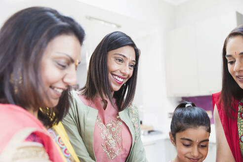 Happy Indian women in saris and bindis - CAIF29050