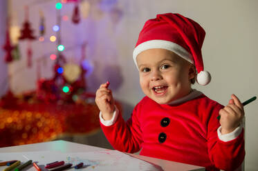 Happy little child in Christmas clothes - ADSF06969