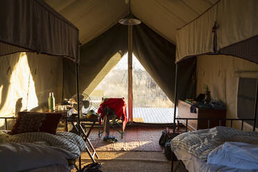 A bedroom in a tented camp, Kalahari Desert. - MINF14959