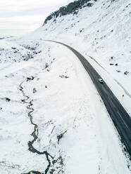 Asphalt road in snowcapped mountains - MALF00024