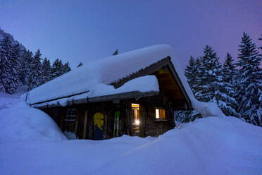 Snow-covered hut in mountains - MALF00048