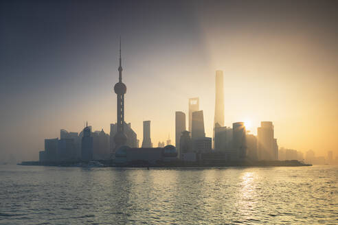 Skyline of Pudong at sunrise, Shanghai, China, Asia - RHPLF16306