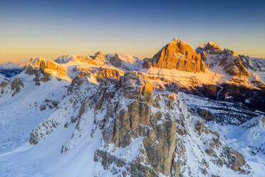 Aerial view by drone of snow capped Ra Gusela, Nuvolau, Averau and Tofane, Giau Pass, Dolomites, Belluno province, Veneto, Italy, Europe - RHPLF17049