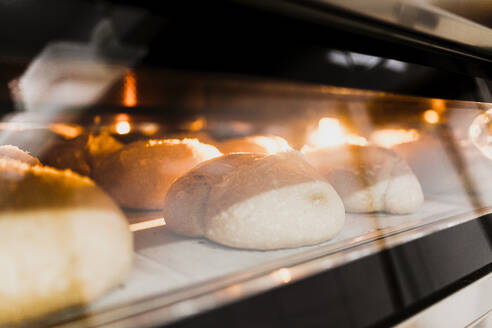 Close-up of baked bread in oven - MRRF00183
