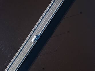 Russia, Republic of Karelia, Sortavala, Aerial view of bridge stretching across Lake Ladoga - KNTF05057