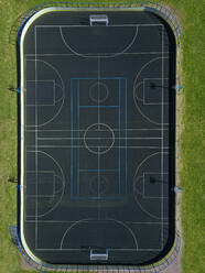 Russia, Republic of Karelia, Sortavala, Aerial view of empty basketball court - KNTF05078