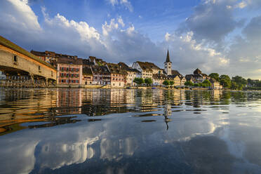 Switzerland, Canton of Thurgau, Diessenhofen, Shiny surface of High Rhine with village houses in background - ELF02172